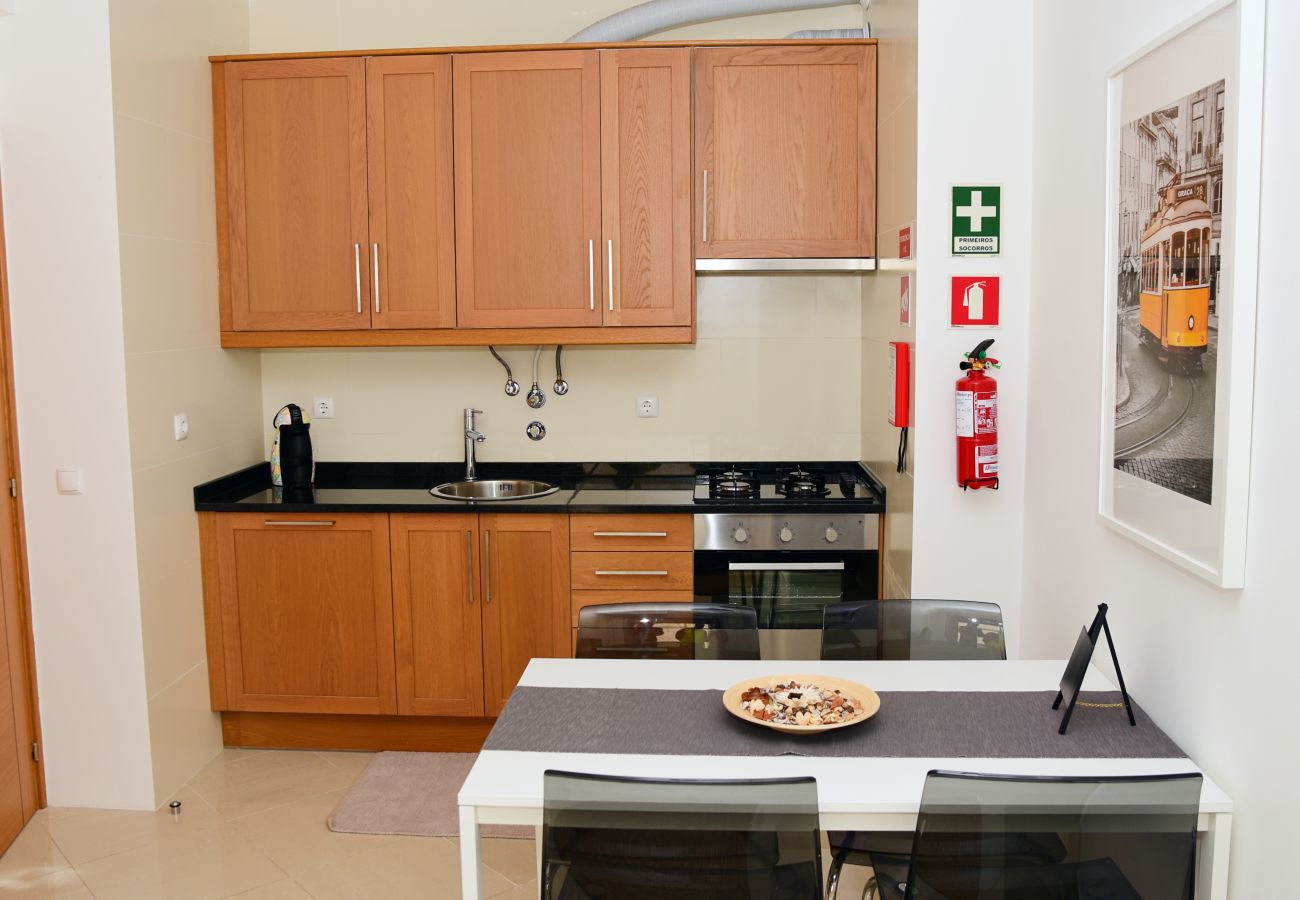 Fully equipped kitchenette next to the dining area